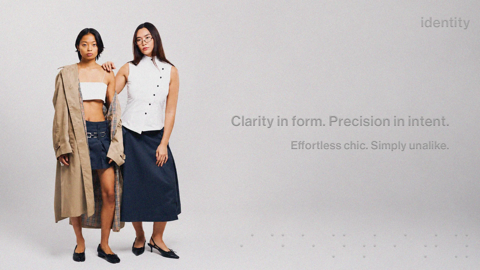 unalike brand identity board showing the wordmark, braille accents and minimal black-and-white style